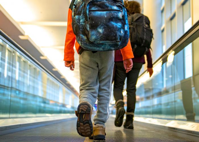 Walking on the moving walkway. 