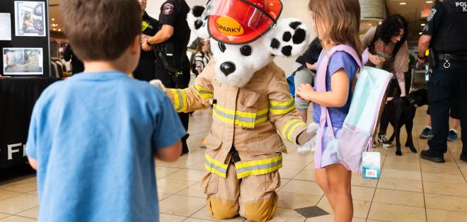 Fire Department mascot and children
